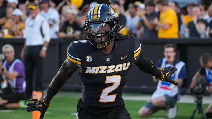 Missouri Tigers cornerback Toriano Pride Jr. (2) celebrates after scoring against the Murray State Racers on a pick six during the first half at Faurot Field at Memorial Stadium.