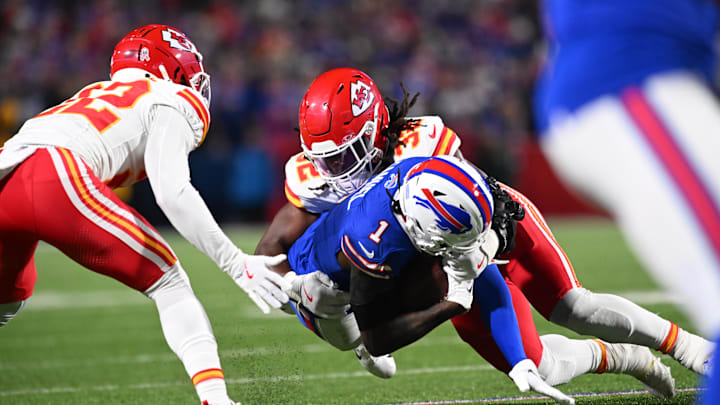 Nov 17, 2024; Orchard Park, New York, USA; Buffalo Bills wide receiver Curtis Samuel (1) is tackled by Kansas City Chiefs linebacker Nick Bolton (32) and cornerback Trent McDuffie (22) in the fourth quarter at Highmark Stadium. Mandatory Credit: Mark Konezny-Imagn Images