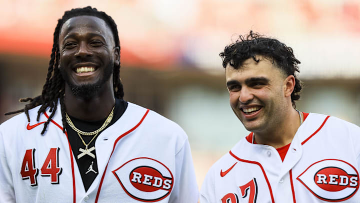 Cincinnati Reds shortstop Elly de la Cruz (44) and first baseman Sal Stewart (27) walk off the field