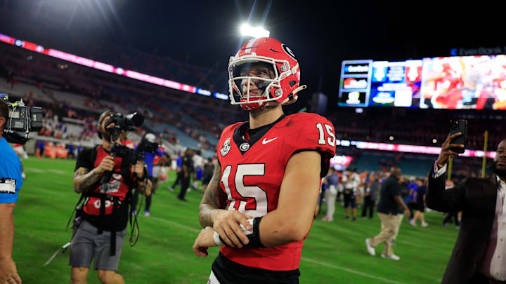 Georgia Bulldogs quarterback Carson Beck (15) walks off the field after the game of an NCAA college football matchup Saturday, Nov. 2, 2024 at EverBank Stadium in Jacksonville, Fla. The Georgia Bulldogs defeated the Florida Gators 34-20.