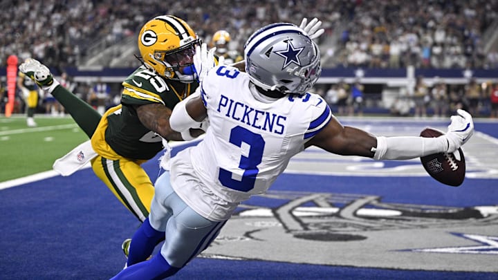 Green Bay Packers cornerback Keisean Nixon (25) breaks up a pass against Dallas Cowboys wide receiver George Pickens (3) in the second half at AT&T Stadium.