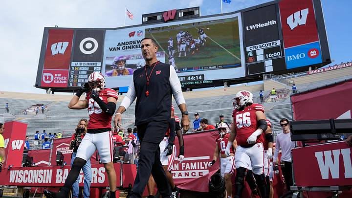 Sep 20, 2025; Madison, Wisconsin, USA;  Wisconsin Badgers head coach Luke Fickell walks onto the field prior to the game against the Maryland Terrapins at Camp Randall Stadium. Mandatory Credit: Jeff Hanisch-Imagn Images