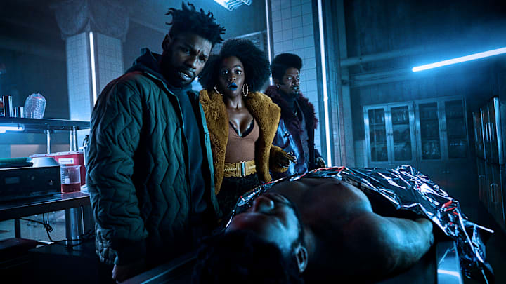 (L to R) John Boyega as Fontaine, Teyonah Parris as Yo-Yo and Jamie Foxx (Producer) as Slick Charles in They Cloned Tyrone (L to R) John Boyega as Fontaine, Teyonah Parris as Yo-Yo and Jamie Foxx (Producer) as Slick Charles in They Cloned Tyrone