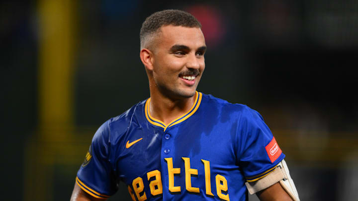 Sep 11, 2025; Seattle, Washington, USA; Seattle Mariners catcher Harry Ford (5) celebrates after the Mariners defeated the Los Angeles Angels at T-Mobile Park. Mandatory Credit: Steven Bisig-Imagn Images
