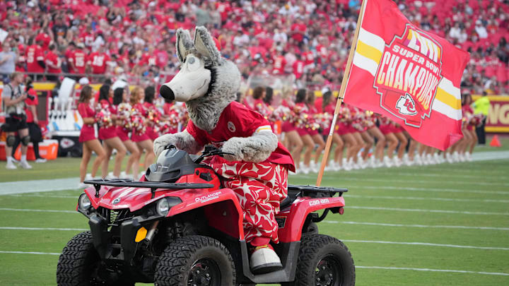 Aug 22, 2024; Kansas City, Missouri, USA; The Kansas City Chiefs mascot KC Wolf rides an atv on field against the Chicago Bears prior to a game at GEHA Field at Arrowhead Stadium. Mandatory Credit: Denny Medley-Imagn Images