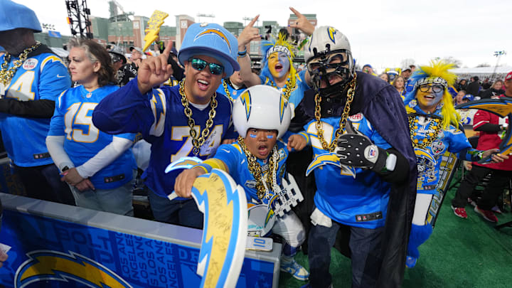 Los Angeles Chargers fans cheer before the first round of the 2025 NFL Draft at Lambeau Field.