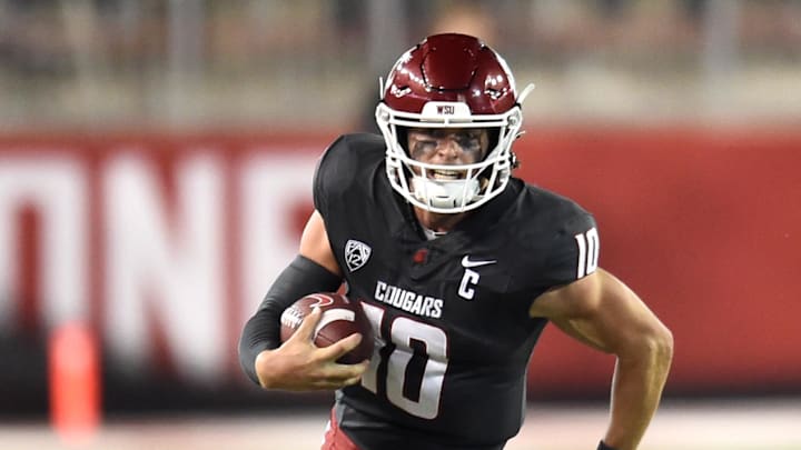 Sep 7, 2024; Pullman, Washington, USA; Washington State Cougars quarterback John Mateer (10) carries the ball against the Texas Tech Red Raiders in the second half at Gesa Field at Martin Stadium. Washington State Cougars won 37-16. Mandatory Credit: James Snook-Imagn Images Sep 7, 2024; Pullman, Washington, USA; Washington State Cougars quarterback John Mateer (10) carries the ball against the Texas Tech Red Raiders in the second half at Gesa Field at Martin Stadium. Washington State Cougars won 37-16. Mandatory Credit: James Snook-Imagn Images