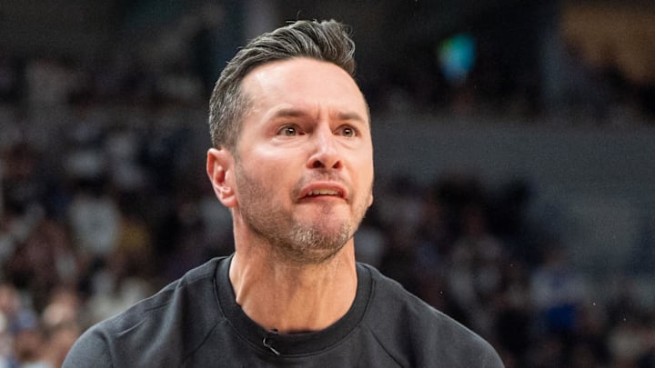 Apr 27, 2025; Minneapolis, Minnesota, USA; Los Angeles Lakers head coach JJ Redick lobbies for possession due to a Minnesota Timberwolves player kicking the ball in the third quarter during game four of first round for the 2025 NBA Playoffs at Target Center. Mandatory Credit: Matt Blewett-Imagn Images Apr 27, 2025; Minneapolis, Minnesota, USA; Los Angeles Lakers head coach JJ Redick lobbies for possession due to a Minnesota Timberwolves player kicking the ball in the third quarter during game four of first round for the 2025 NBA Playoffs at Target Center. Mandatory Credit: Matt Blewett-Imagn Images