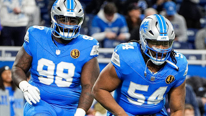 Detroit Lions defensive tackle Alim McNeill (54) and defensive tackle DJ Reader (98) warm up at Ford Field 