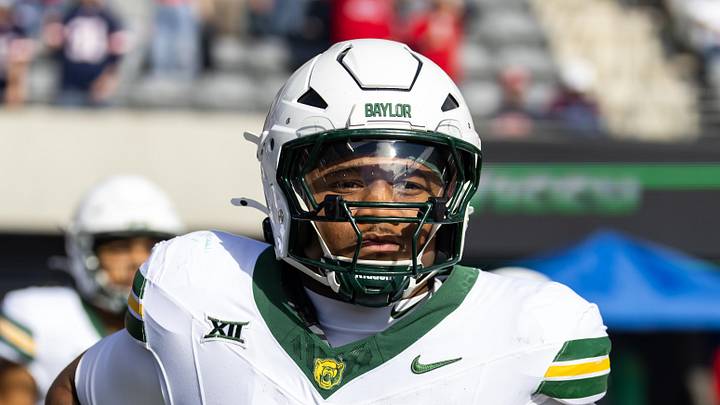 Nov 22, 2025; Tucson, Arizona, USA; Baylor Bears defensive lineman Jackie Marshall (0) against the Arizona Wildcats at Casino Del Sol Stadium. Mandatory Credit: Mark J. Rebilas-Imagn Images