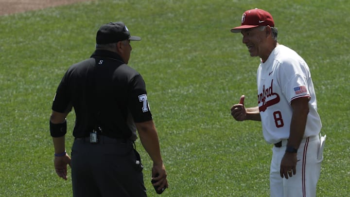 Jun 19, 2021; Omaha, Nebraska, USA; Stanford Cardinal head coach David Esquer talks to an umpire during the game against the NC State Wolfpack at TD Ameritrade Park. Mandatory Credit: Bruce Thorson-Imagn Images Jun 19, 2021; Omaha, Nebraska, USA; Stanford Cardinal head coach David Esquer talks to an umpire during the game against the NC State Wolfpack at TD Ameritrade Park. Mandatory Credit: Bruce Thorson-Imagn Images
