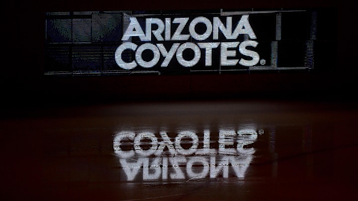 Oct 14, 2017; Glendale, AZ, USA; The Arizona Coyotes logo is reflected on the ice prior to the game