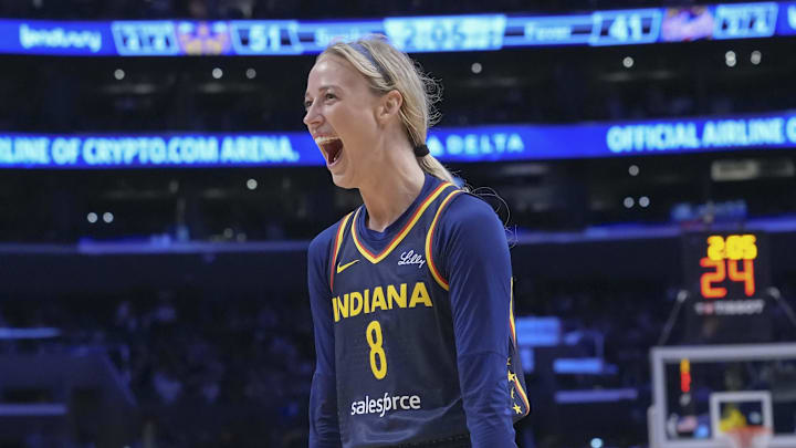 Aug 5, 2025; Los Angeles, California, USA; Indiana Fever guard Sophie Cunningham (8) reacts to the fans in the first half against the LA Sparks at Crypto.com Arena. Mandatory Credit: Kirby Lee-Imagn Images