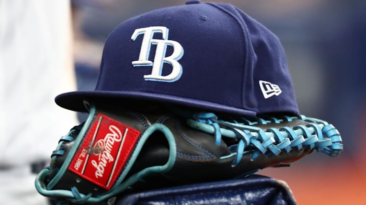 Sep 6, 2019; St. Petersburg, FL, USA; A detail view of a Tampa Bay Rays hat and glove at Tropicana Field.