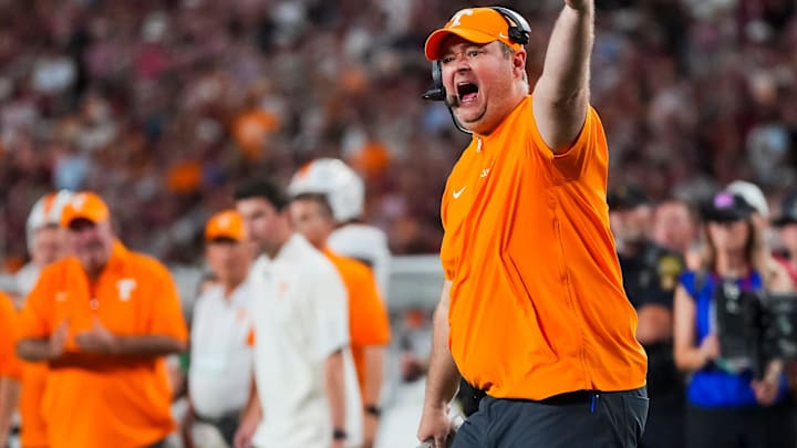 Tennessee coach Josh Heupel points to the running clock while yelling at the referees for a timeout during a college football game between Tennessee and Alabama at Bryant-Denny Stadium in Tuscaloosa, Ala., on Oct. 18, 2025.