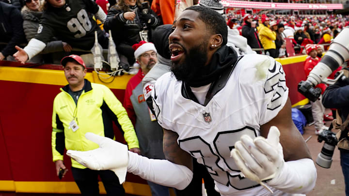 Dec 25, 2023; Kansas City, Missouri, USA; Las Vegas Raiders cornerback Nate Hobbs (39) interacts with the crowd after defeating the Kansas City Chiefs at GEHA Field at Arrowhead Stadium. Mandatory Credit: Jay Biggerstaff-USA TODAY Sports