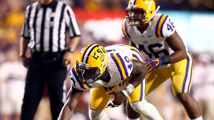 November 10, 2012; Baton Rouge, LA, USA; LSU Tigers defensive end Barkevious Mingo (49) lines up prior to the snap during the first half at Tiger Stadium. LSU defeated Mississippi State 37-17. Mandatory Credit: Crystal LoGiudice-USA TODAY Sports