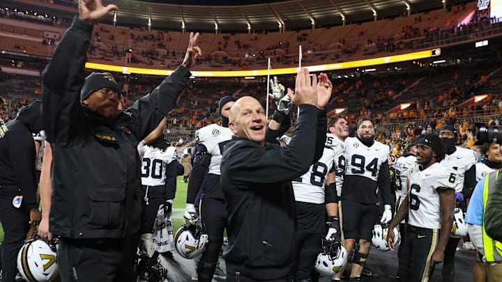 Nov 29, 2025; Knoxville, Tennessee, USA;  Vanderbilt Commodores head coach Clark Lea celebrates with his team after a game against the Tennessee Volunteers at Neyland Stadium. Mandatory Credit: Randy Sartin-Imagn Images