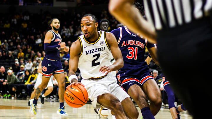 Mizzou men's basketball guard Tamar Bates dribbles during a game against Auburn on Tuesday at Mizzou Arena in Columbia