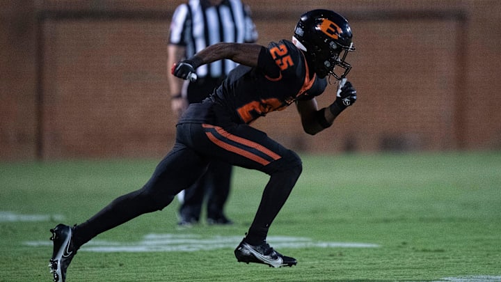 Ensworth's Justin Hopkins (25) goes in motion against Lipscomb Academy' during their game at Ensworth High School in Nashville, Tenn., Friday, Sept. 20, 2024.