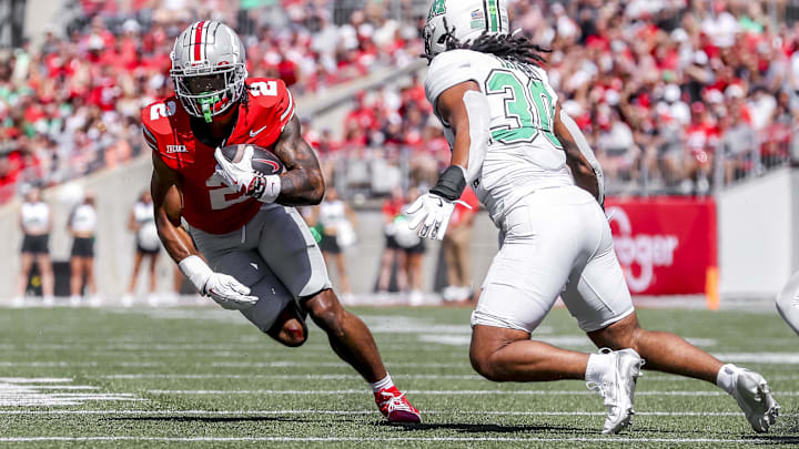 Sep 21, 2024; Columbus, Ohio, USA; Ohio State Buckeyes wide receiver Emeka Egbuka (2) runs the ball during the second quarter against the Marshall Thundering Herd at Ohio Stadium. Sep 21, 2024; Columbus, Ohio, USA; Ohio State Buckeyes wide receiver Emeka Egbuka (2) runs the ball during the second quarter against the Marshall Thundering Herd at Ohio Stadium.