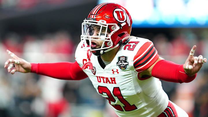 Dec 23, 2023; Las Vagas, NV, USA; Utah Utes linebacker Karene Reid (21) warms up before a game against the Northwestern Wildcats at Allegiant Stadium. 