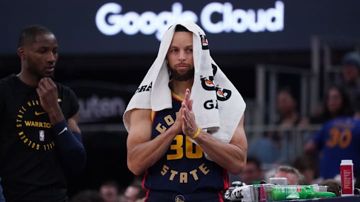 Golden State Warriors guard Stephen Curry (30) prepares to enter the game against the Denver Nuggets in the second period at Chase Center.