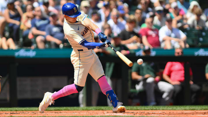 Seattle Mariners left fielder Sam Haggerty hits an RBI single against the Oakland Athletics on May 12 at T-Mobile Park.