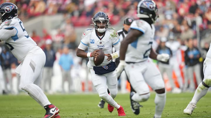 Dec 14, 2025; Santa Clara, California, USA;  Tennessee Titans quarterback Cam Ward (1) runs with the ball during the second quarter against the San Francisco 49ers at Levi's Stadium. Mandatory Credit: Cary Edmondson-Imagn Images
