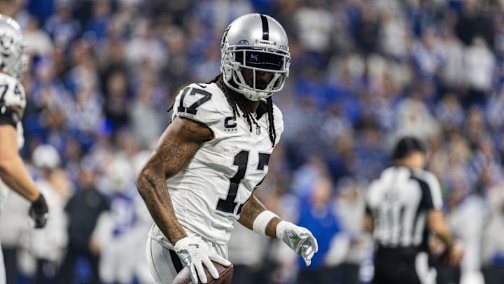 Dec 31, 2023; Indianapolis, Indiana, USA; Las Vegas Raiders wide receiver Davante Adams (17) celebrates his touchdown  in the second half  against the Indianapolis Colts at Lucas Oil Stadium. Mandatory Credit: Trevor Ruszkowski-Imagn Images