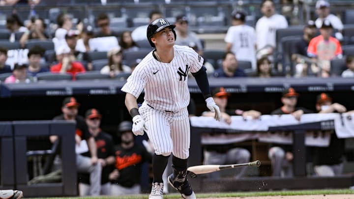Bronx, New York, USA; New York Yankees shortstop Anthony Volpe (11) hits a solo home run against the Baltimore Orioles during the fifth inning at Yankee Stadium. Mandatory Credit: John Jones-Imagn Images