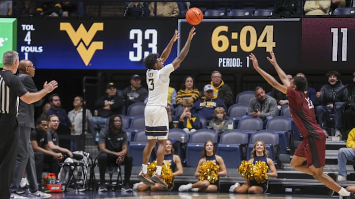 Dec 9, 2025; Morgantown, West Virginia, USA; West Virginia Mountaineers guard Honor Huff (3) shoots a three pointer during the first half against the Little Rock Trojans at Hope Coliseum. Dec 9, 2025; Morgantown, West Virginia, USA; West Virginia Mountaineers guard Honor Huff (3) shoots a three pointer during the first half against the Little Rock Trojans at Hope Coliseum.