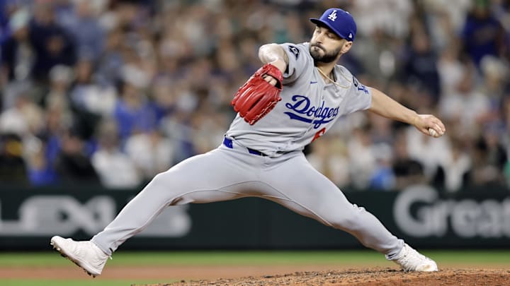 Sep 26, 2025; Seattle, Washington, USA; Los Angeles Dodgers pitcher Tanner Scott (66) throws against the Seattle Mariners during the ninth inning at T-Mobile Park. Mandatory Credit: John Froschauer-Imagn Images