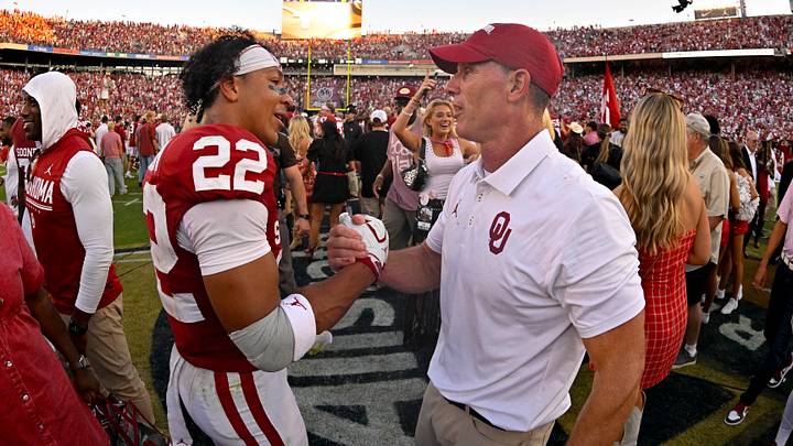 Oct 10, 2026; Dallas, Texas, USA; Oklahoma Sooners head coach Brent Venables celebrates with defensive back Peyton Bowen (22) after the game between the Sooners and the Longhorns. Mandatory Credit: Jerome Miron-Imagn Images Oct 10, 2026; Dallas, Texas, USA; Oklahoma Sooners head coach Brent Venables celebrates with defensive back Peyton Bowen (22) after the game between the Sooners and the Longhorns. Mandatory Credit: Jerome Miron-Imagn Images