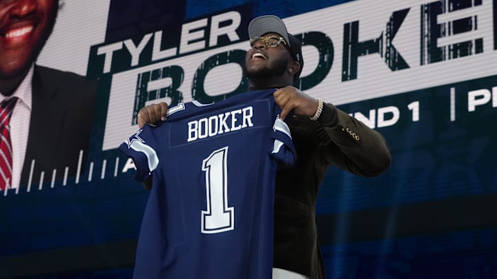 Alabama Crimson Tide offensive lineman Tyler Booker is selected by the Dallas Cowboys as the No. 12 pick in the2025 NFL Draft.