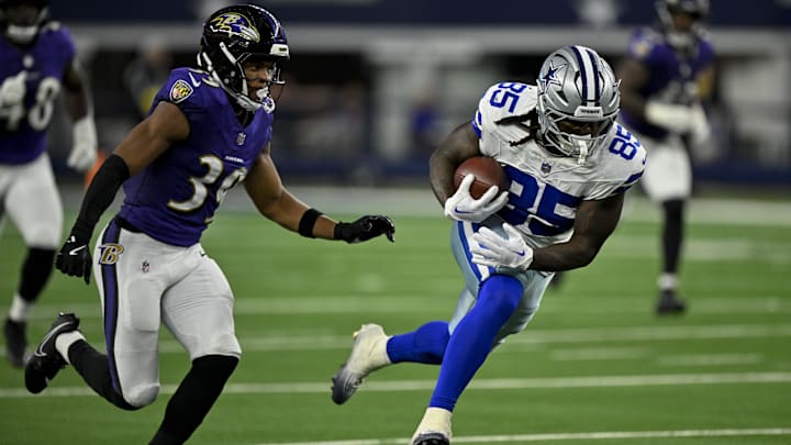 Baltimore Ravens safety Keondre Jackson and Dallas Cowboys tight end Princeton Fant in action during Week 2 of the preseason.