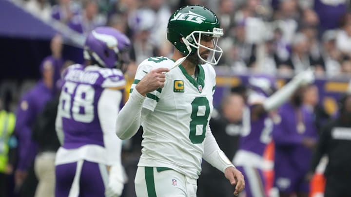 Oct 6, 2024; London, United Kingdom; New York Jets quarterback Aaron Rodgers (8) reacts after throwing an interception against the Minnesota Vikings in the first half at Tottenham Hotspur Stadium. Mandatory Credit: Kirby Lee-Imagn Images