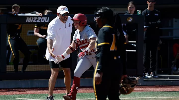 Alabama Head Coach Patrick Murphy and Alabama Softball Player Alexis Pupillo (31) in action against Mizzou at Mizzou Softball Stadium on Saturday, Mar 21, 2026.