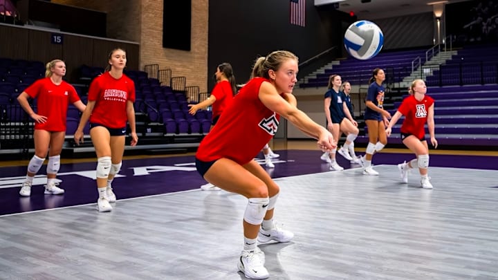 Arizona warms up for its match against Kansas State Arizona warms up for its match against Kansas State