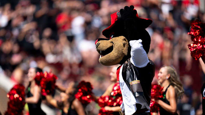 Cincinnati Bearcats mascot performs with the dance team in the second quarter of the College Football game between the Cincinnati Bearcats and the Houston Cougars at Nippert Stadium in Cincinnati on Saturday, Sept. 21, 2024.