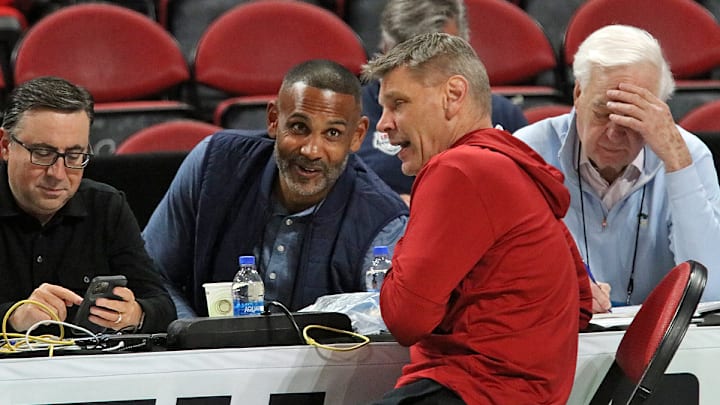 Oklahoma coach Porter Moser talks with Ian Eagle, Grant Hill, Bill Raftery and the CBS Sports crew during Thursday's shootaround at the NCAA Tournament Raleigh Regional.