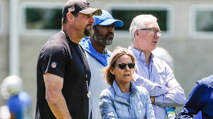 Detroit Lions head coach Dan Campbell, general manager Brad Holmes, owner Sheila Ford Hamp and president Rod Wood.