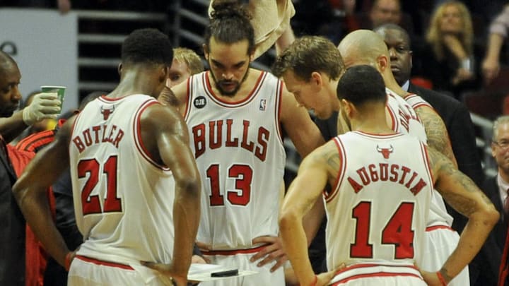 Apr 29, 2014; Chicago, IL, USA Chicago Bulls guard Jimmy Butler (21), center Joakim Noah (13), guard D.J. Augustin (14) and forward Mike Dunleavy (34) huddle against the Washington Wizards in game five in the first round of the 2014 NBA Playoffs at United Center. Mandatory Credit: Matt Marton-Imagn Images Apr 29, 2014; Chicago, IL, USA Chicago Bulls guard Jimmy Butler (21), center Joakim Noah (13), guard D.J. Augustin (14) and forward Mike Dunleavy (34) huddle against the Washington Wizards in game five in the first round of the 2014 NBA Playoffs at United Center. Mandatory Credit: Matt Marton-Imagn Images