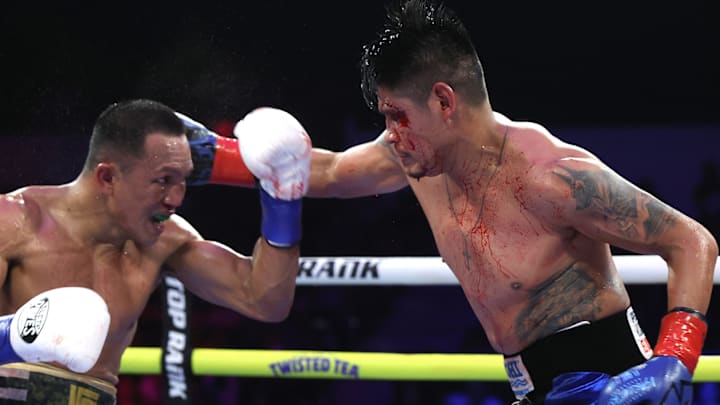 Emanuel Navarrete (right) vs Charly Suarez (left).