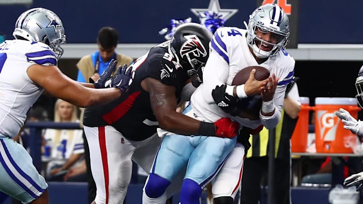 Dallas Cowboys quarterback Dak Prescott scores a third quarter touchdown against Atlanta Falcons.