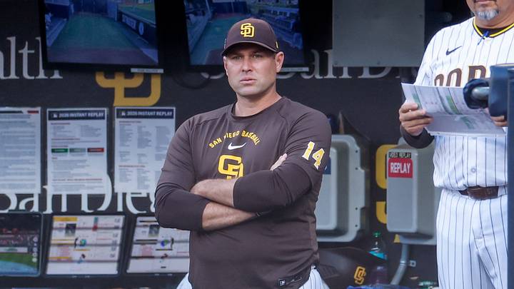 Aug 22, 2026; San Diego, California, USA;  San Diego Padres manager Craig Stammen (14) watches play during the first inning against the Minnesota Twins at Petco Park.  Mandatory Credit: David Frerker-Imagn Images