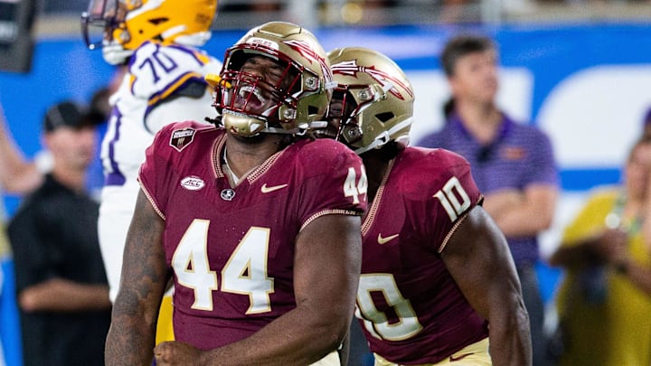 Sep 5, 2023; Orlando, Florida, USA; Florida State Seminoles defensive lineman Joshua Farmer (44) celebrates a sack during a game against the LSU Tigers on Sunday, Sept. 3, 2023. Mandatory Credit: Alicia Devine-Imagn Images