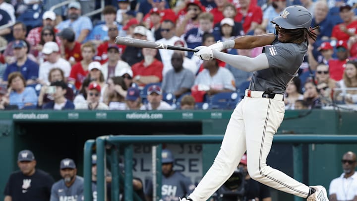 Sep 28, 2024; Washington, District of Columbia, USA; Washington Nationals outfielder James Wood (29) hits a two run home run against the Philadelphia Phillies during the sixth inning at Nationals Park. Sep 28, 2024; Washington, District of Columbia, USA; Washington Nationals outfielder James Wood (29) hits a two run home run against the Philadelphia Phillies during the sixth inning at Nationals Park.