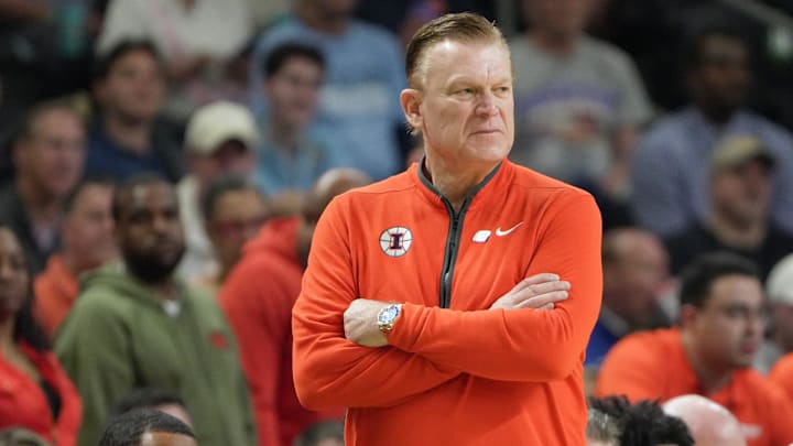 Illinois Fighting Illini head coach Brad Underwood watches as his team plays March 21, 2026 during the first half of the NCAA Men’s Basketball Tournament second round game against VCU at the Bon Secours Wellness Arena in Greenville, South Carolina. Illinois Fighting Illini head coach Brad Underwood watches as his team plays March 21, 2026 during the first half of the NCAA Men’s Basketball Tournament second round game against VCU at the Bon Secours Wellness Arena in Greenville, South Carolina.