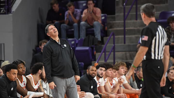 Nov 21, 2024; Clemson, SC, USA; Clemson Head Coach Brad Brownell smiles after a referee call in the game with Radford during the first half at Littlejohn Coliseum Thursday, November 21, 2024; Clemson, SC, USA. Nov 21, 2024; Clemson, SC, USA; Clemson Head Coach Brad Brownell smiles after a referee call in the game with Radford during the first half at Littlejohn Coliseum Thursday, November 21, 2024; Clemson, SC, USA.
